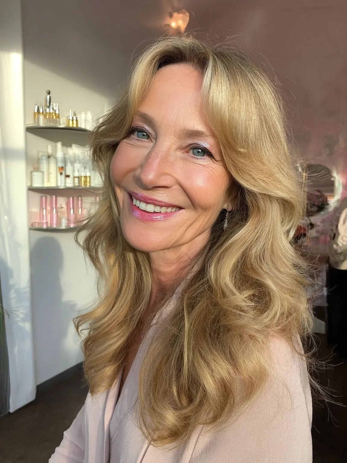 Long Voluminous Golden Blonde Layers with Curtain Bangs